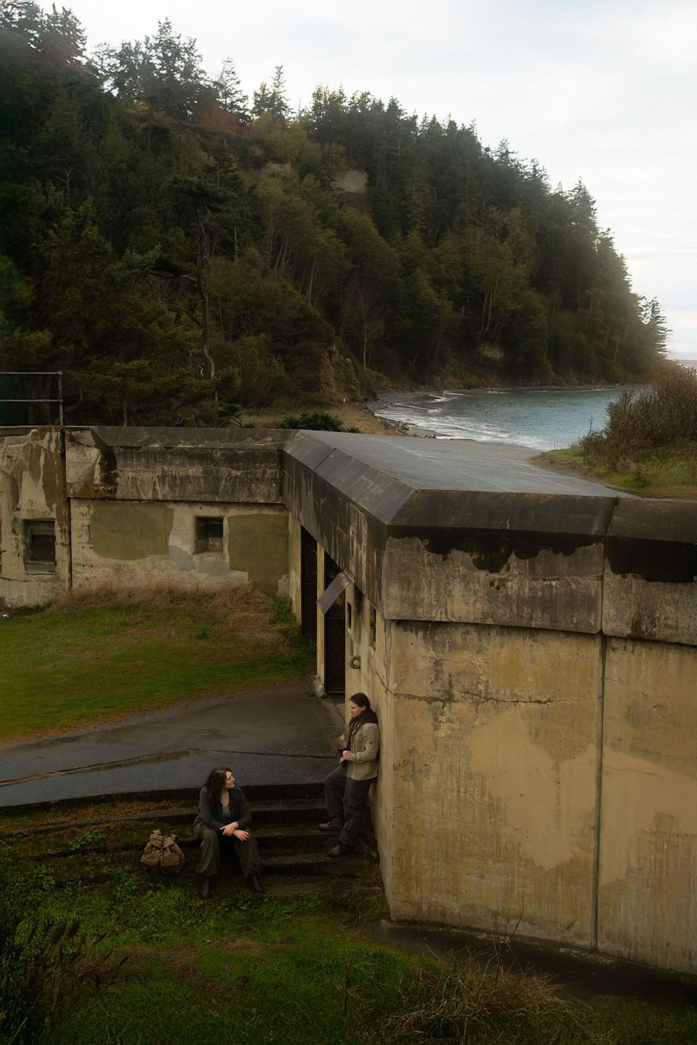 Historic concrete military bunkers line the coastline at Fort Worden State Park near Port Townsend, Washington.