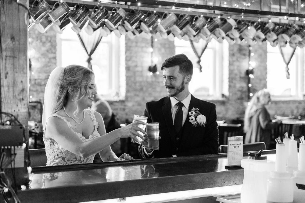 A black and white wedding photo collage showing candid moments at the reception and bar area.