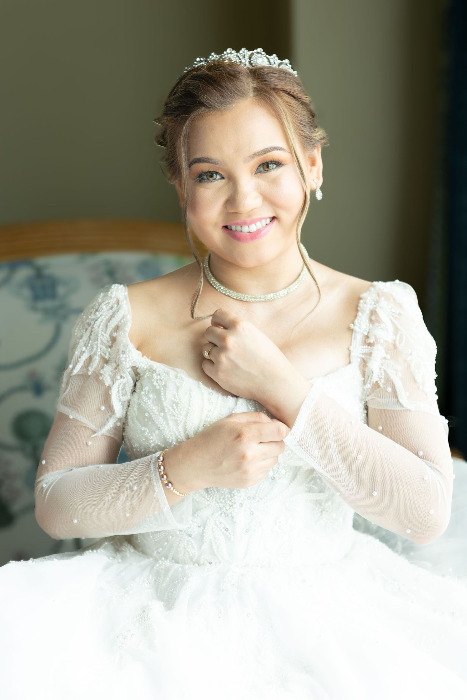 Candid bridal portraits showing joyful expressions in a white lace wedding gown.