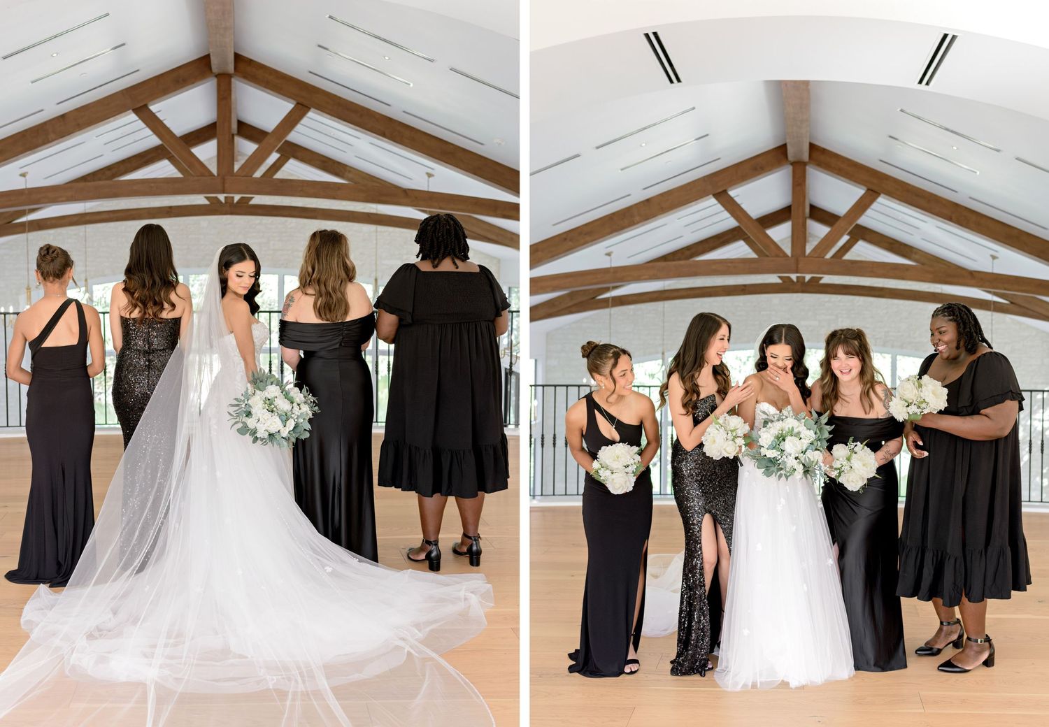 A wedding party stands together in a bright white room with exposed wooden beams and vaulted ceilings.