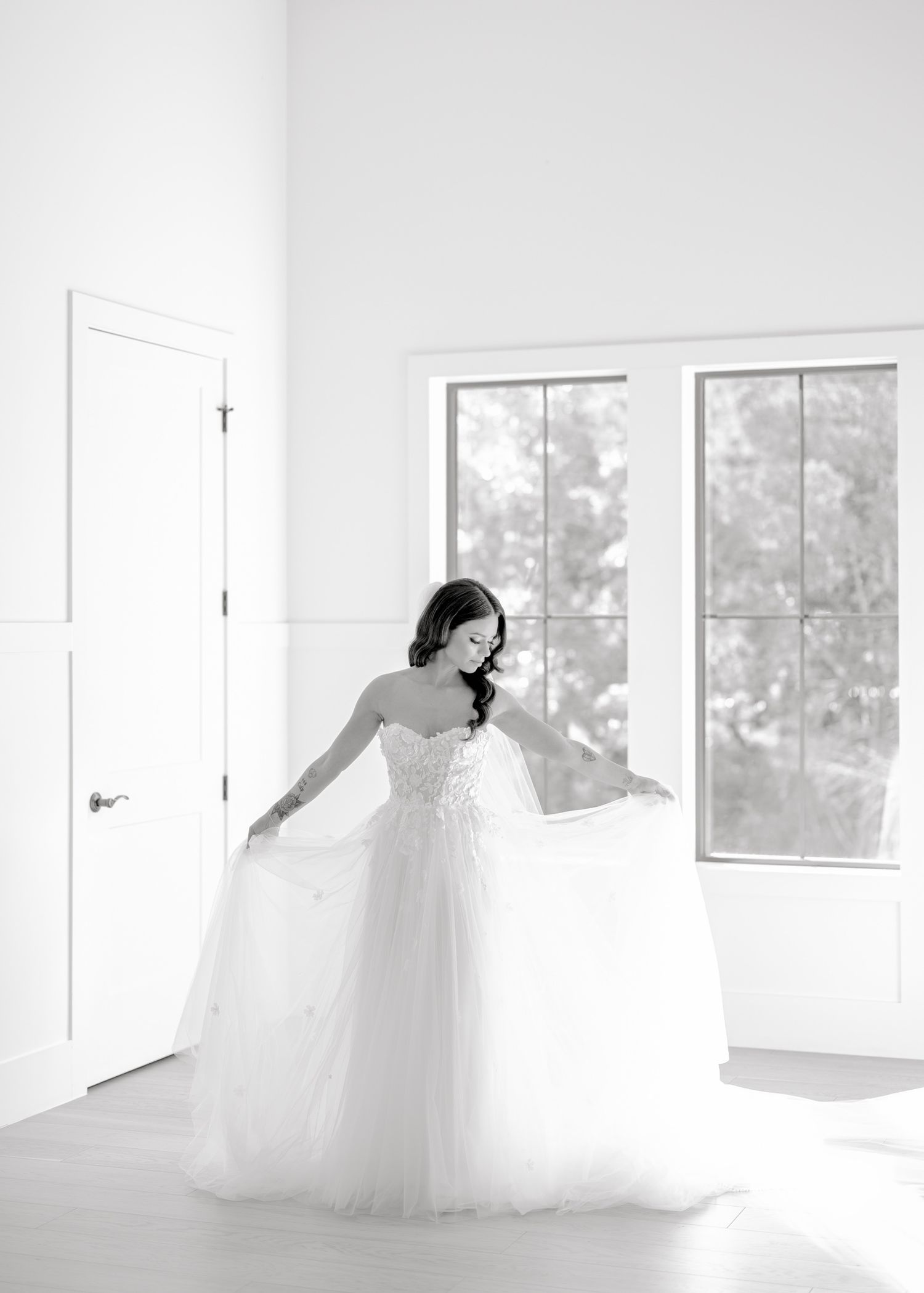 A series of ethereal bridal portraits in a light-filled white room with large windows.