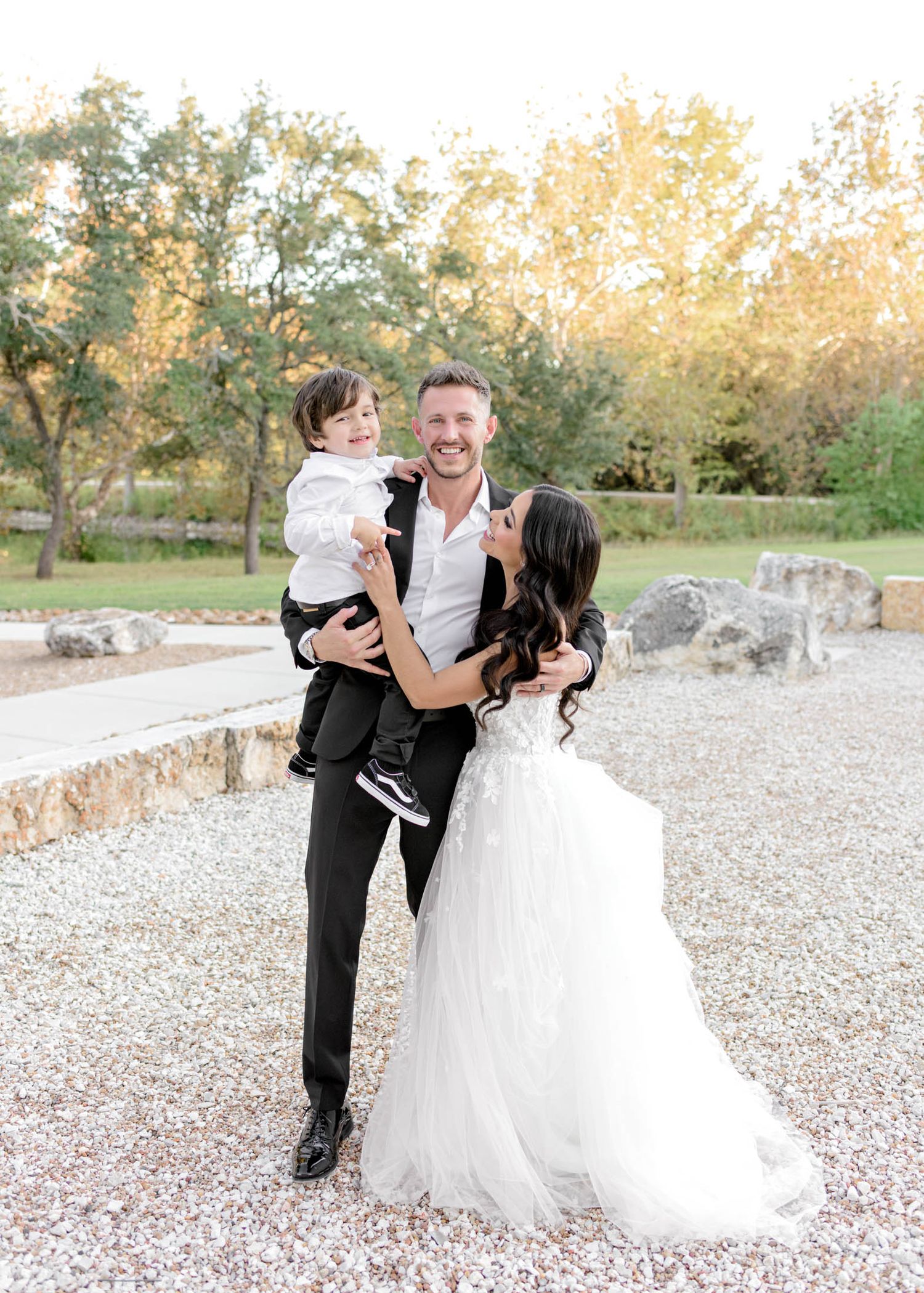 A romantic wedding photo sequence showing a couple sharing playful and tender moments on a gravel path at sunset.