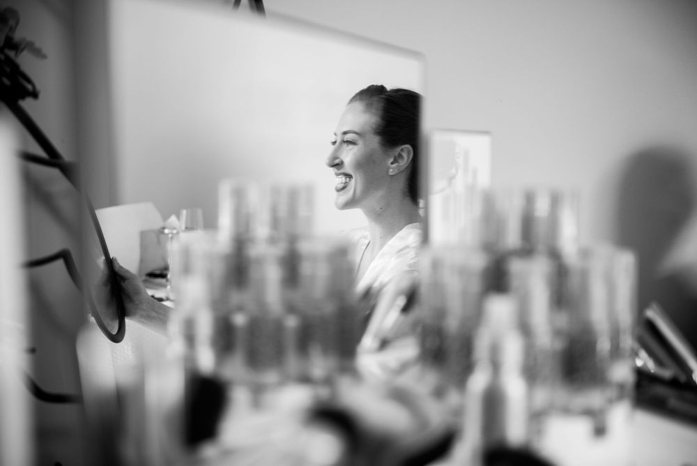 Candid black and white sequence of laughter and natural reactions.
