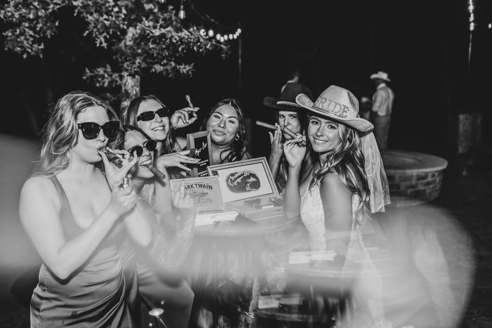 Candid cigar bar photos during a fall wedding taken by april pinto photography