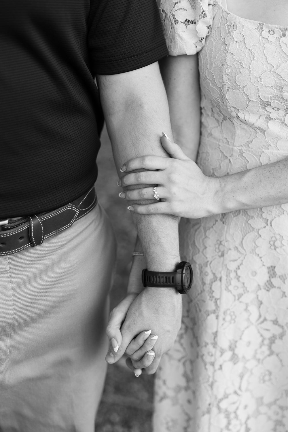 A black and white photo sequence showing hands holding together intimately in a romantic wedding moment.