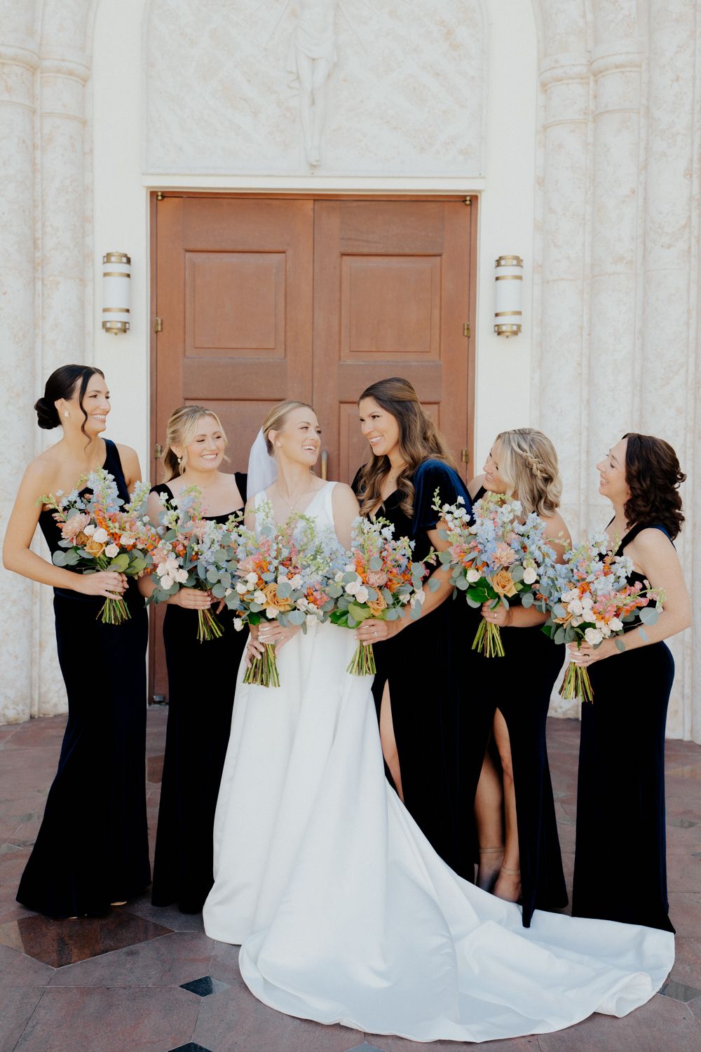 Close-up shot of intertwined hands showing tender wedding moment at Winter Park Events Center