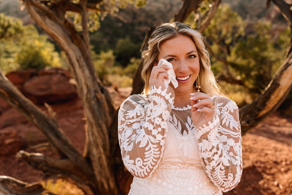Emotional moment captured during Sedona desert wedding photoshoot.