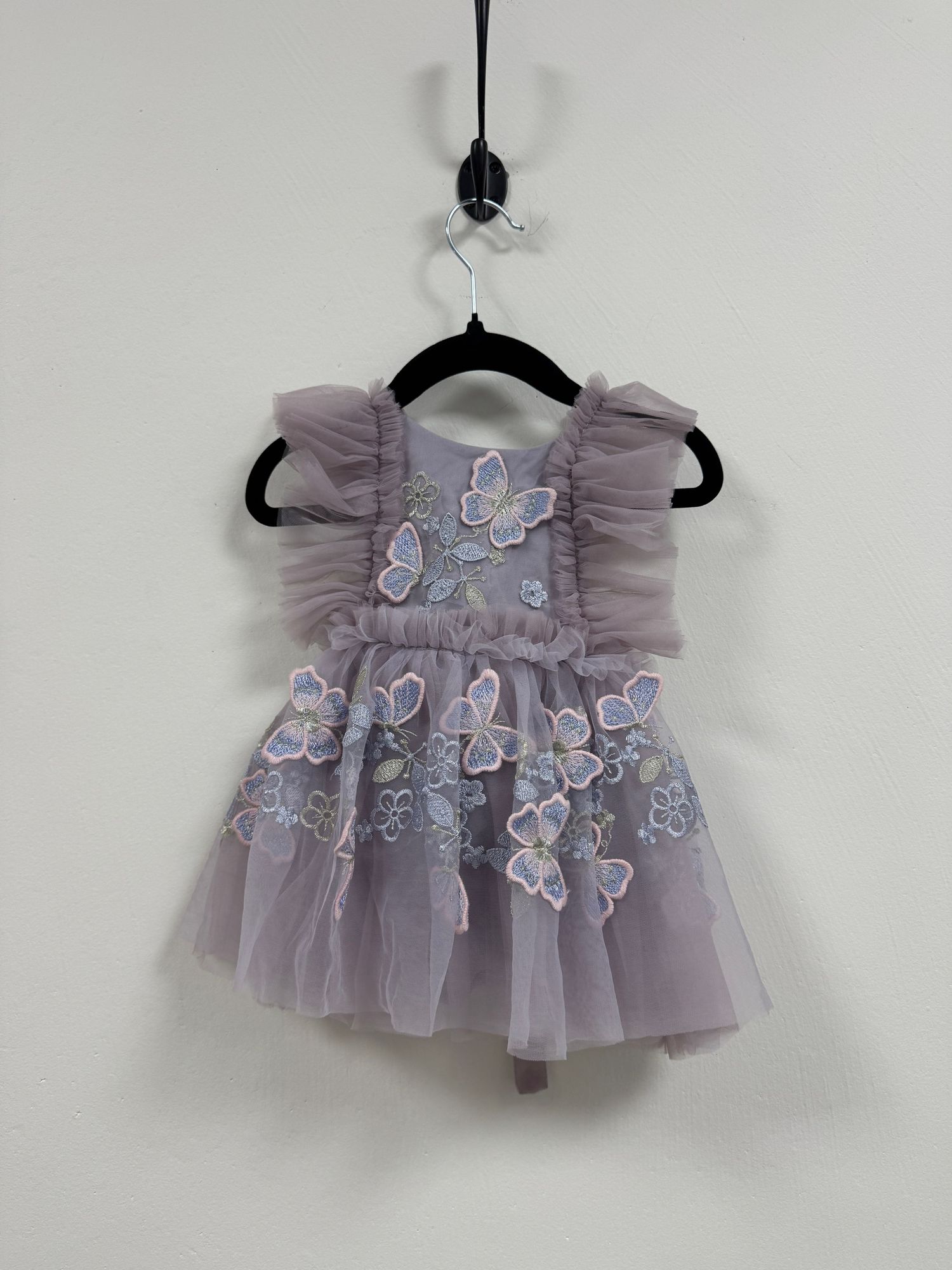 Pretty pink tulle dress with sequined embellishments and ruffled neckline for special occasions, shown in multiple angles.