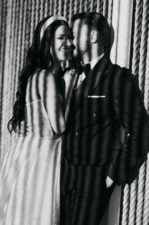Artistic black and white portrait with rope textured background.