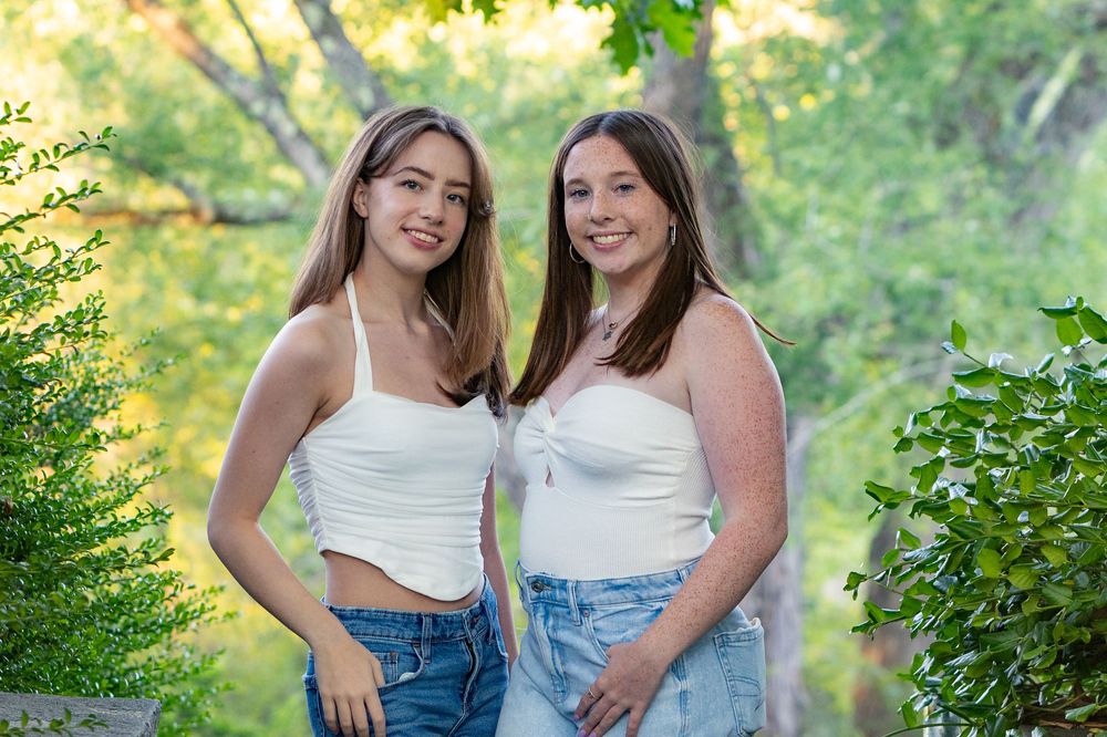 High School Seniors pose for their yearbook portraits at Old North Bridge in Concord, MA with Lisa West Photography.