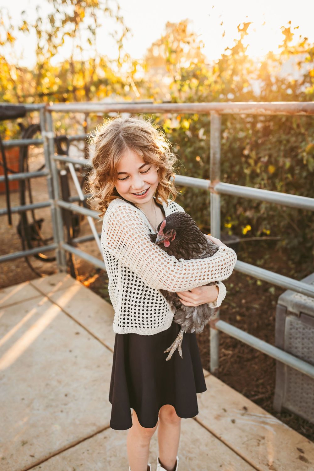 A heartwarming sequence of embraces between two people on a wooden deck during golden hour sunset.