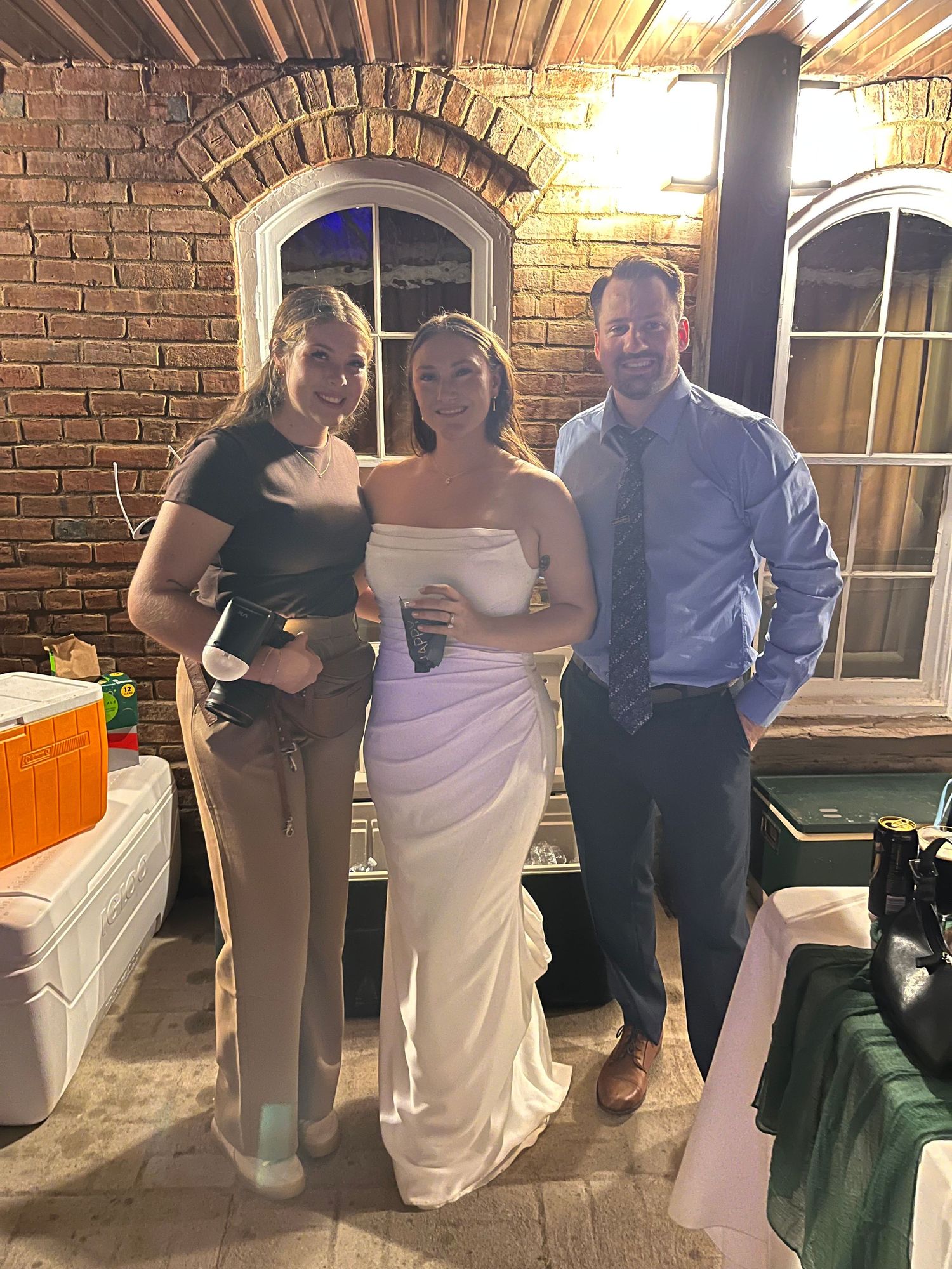 The photographer with her couples.