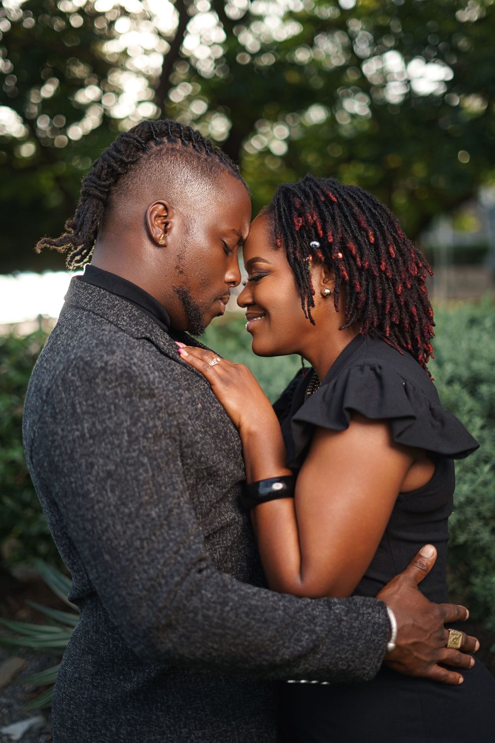 A romantic couple shares intimate moments in a series of outdoor portraits with natural bokeh lighting effects.