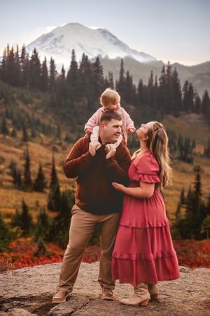 Family together during their family adventure photography session at Mt. Rainier National Park near Seattle, Washington