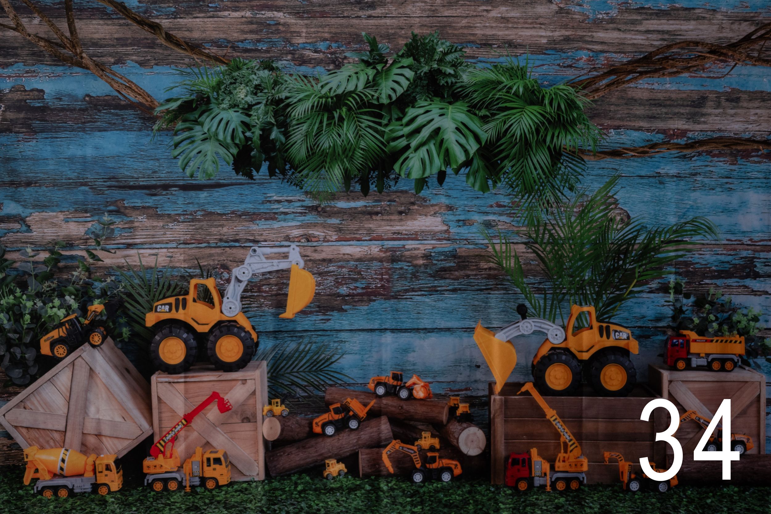Rustic wooden backdrop decorated with autumn pumpkins, leaves, and seasonal fall decor for a cozy harvest display.