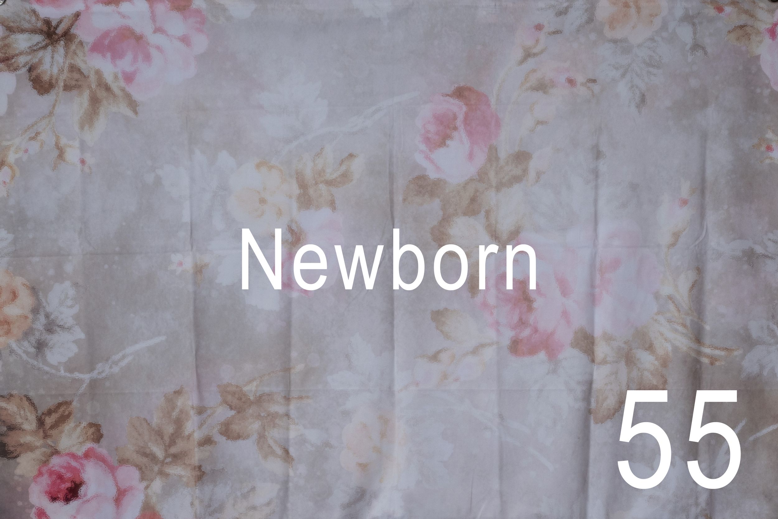 A vintage-style floral wallpaper pattern with pink roses and gray background creates a romantic, shabby chic design.
