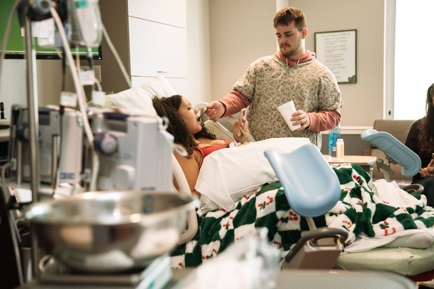 Unposed birth photography in Nashville capturing mother in active labor