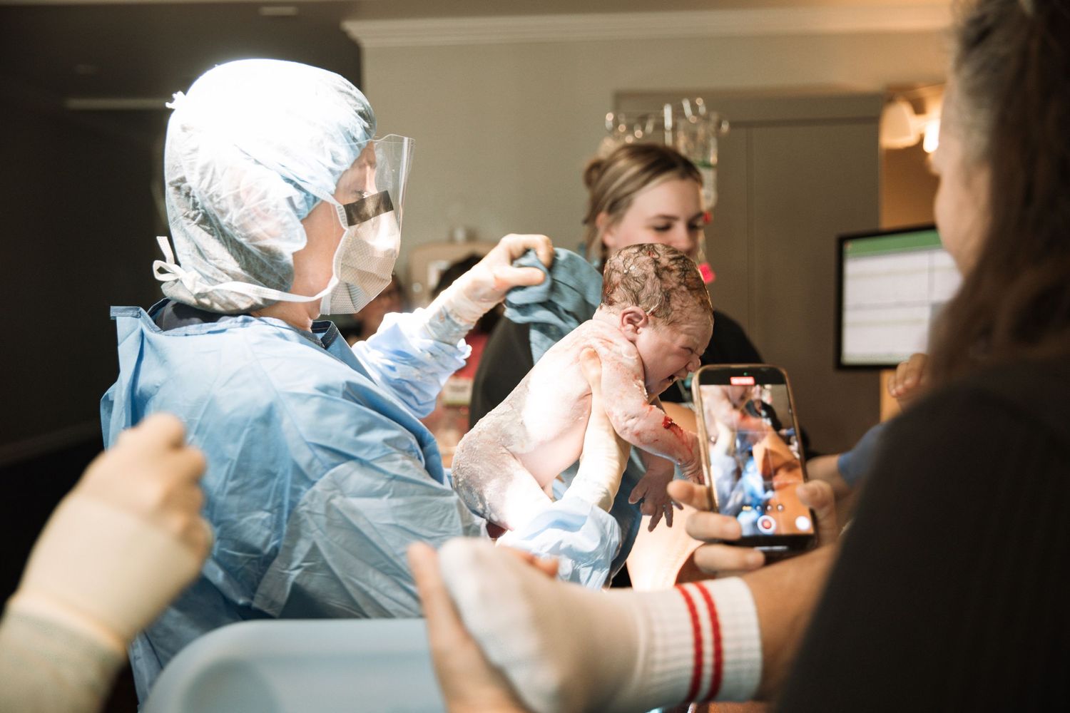 Middle Tennessee birth photography showing natural active labor and pushing hospital birth experience