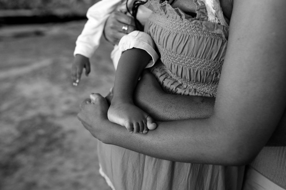 Emotive story telling family photograph in black and white in Cape Town