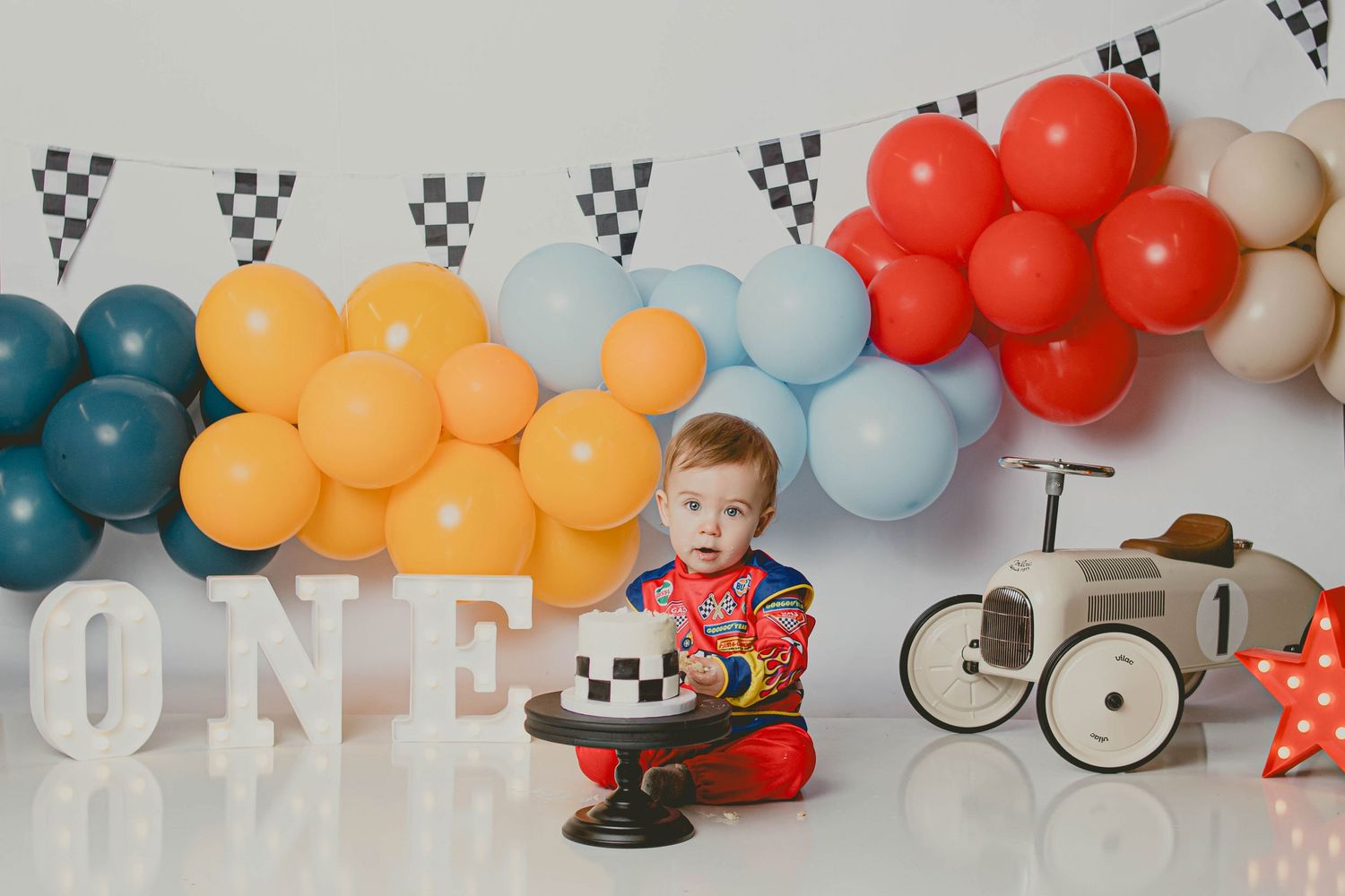 First Birthday Photographer Milestone Oklahoma Milestone Photographer 1st birthday shoot Oklahoma Cake Smash Photographer race car