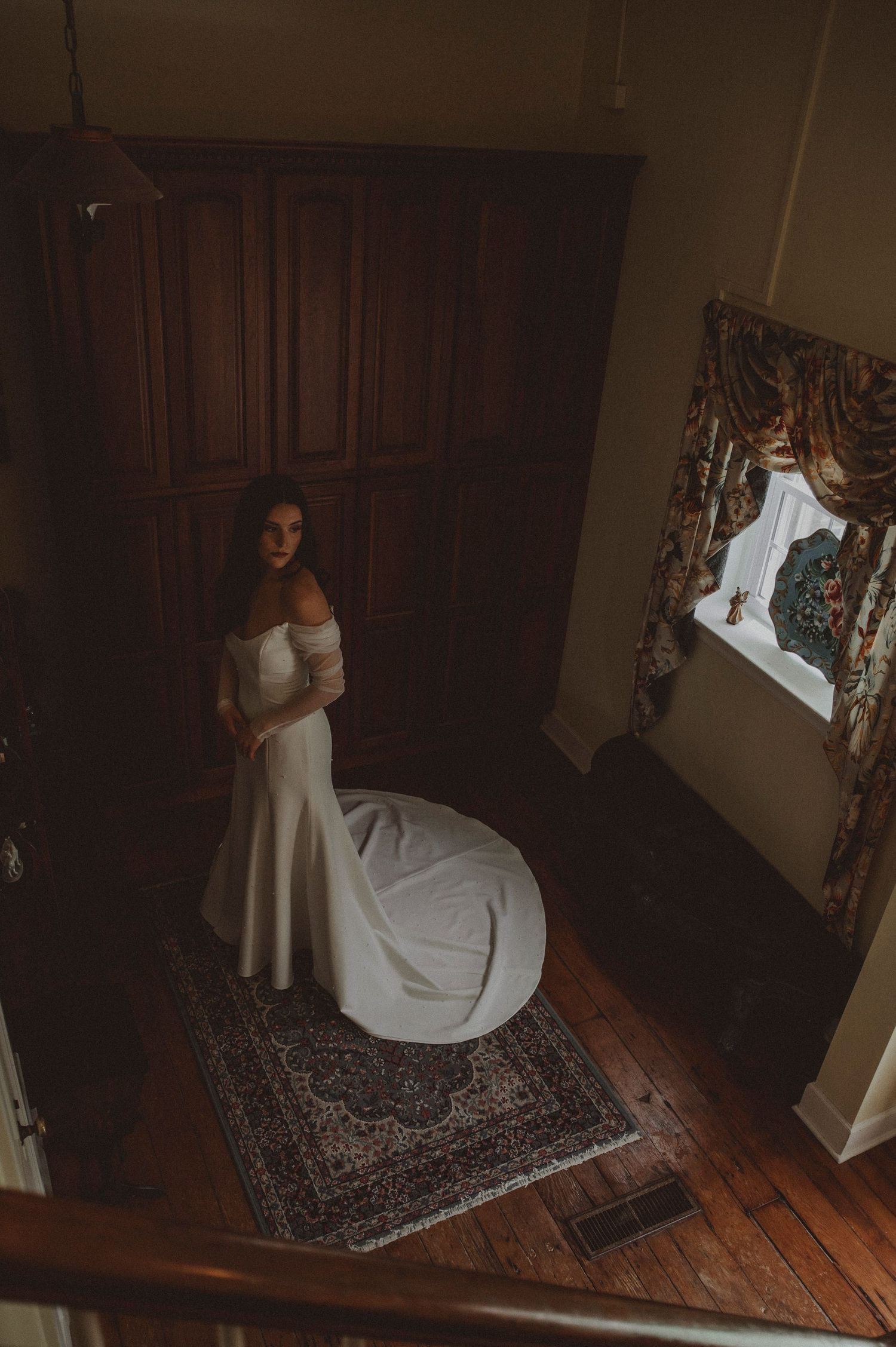 Moody fine art bridal portrait with vintage flair captured in romantic light during a Lexington KY spring wedding at Village View Farm Event