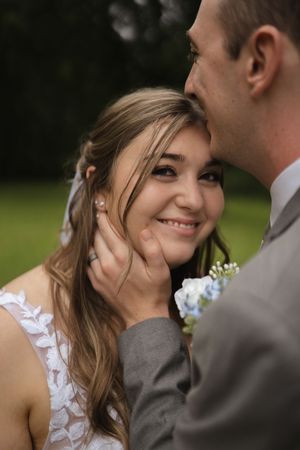 A romantic wedding moment captured in a series of candid shots showing tender expressions between the couple.