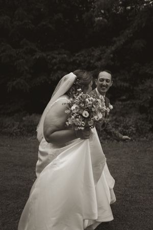 A black and white wedding photo sequence showing intimate moments with floral bouquet details.