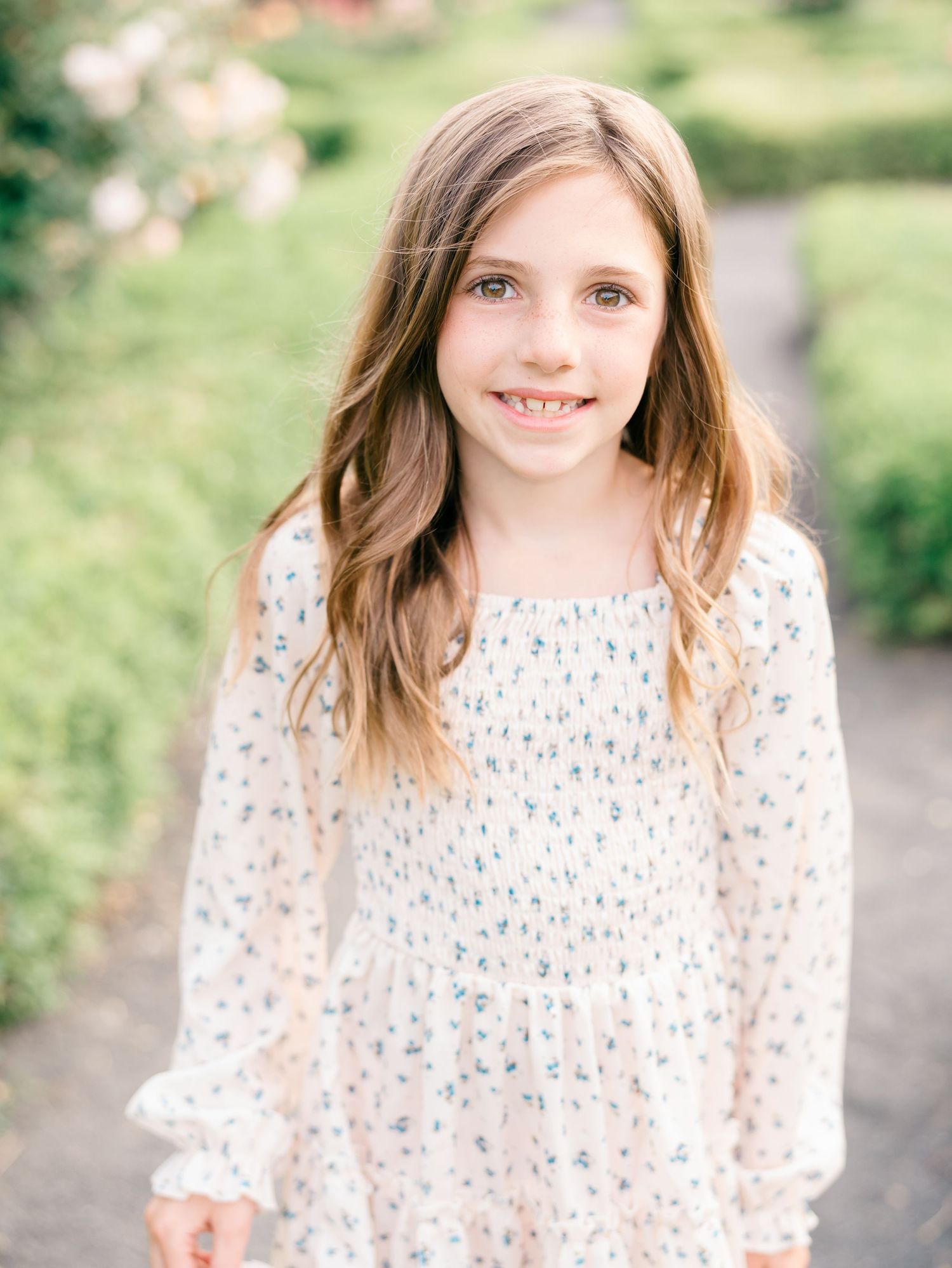 close of portrait of young girl at a garden near Holmdel Nj.
