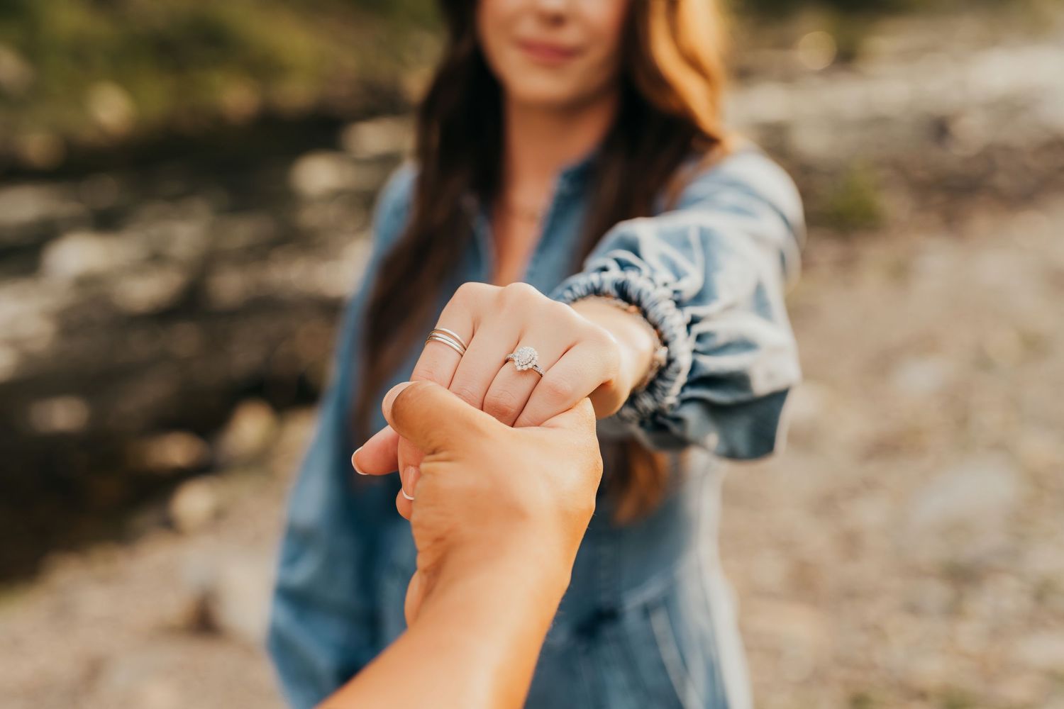 Close up of engagement ring during an engagement session in Broken Bow.