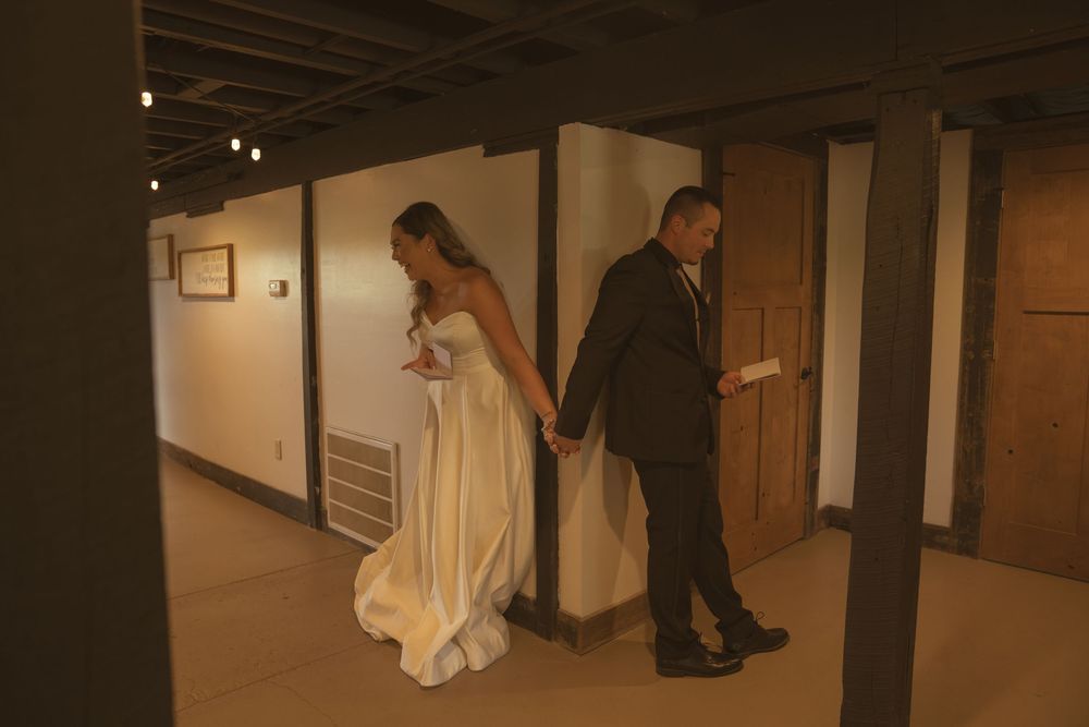 Artistic low-angle hallway shots capturing wedding day moments in muted tones.