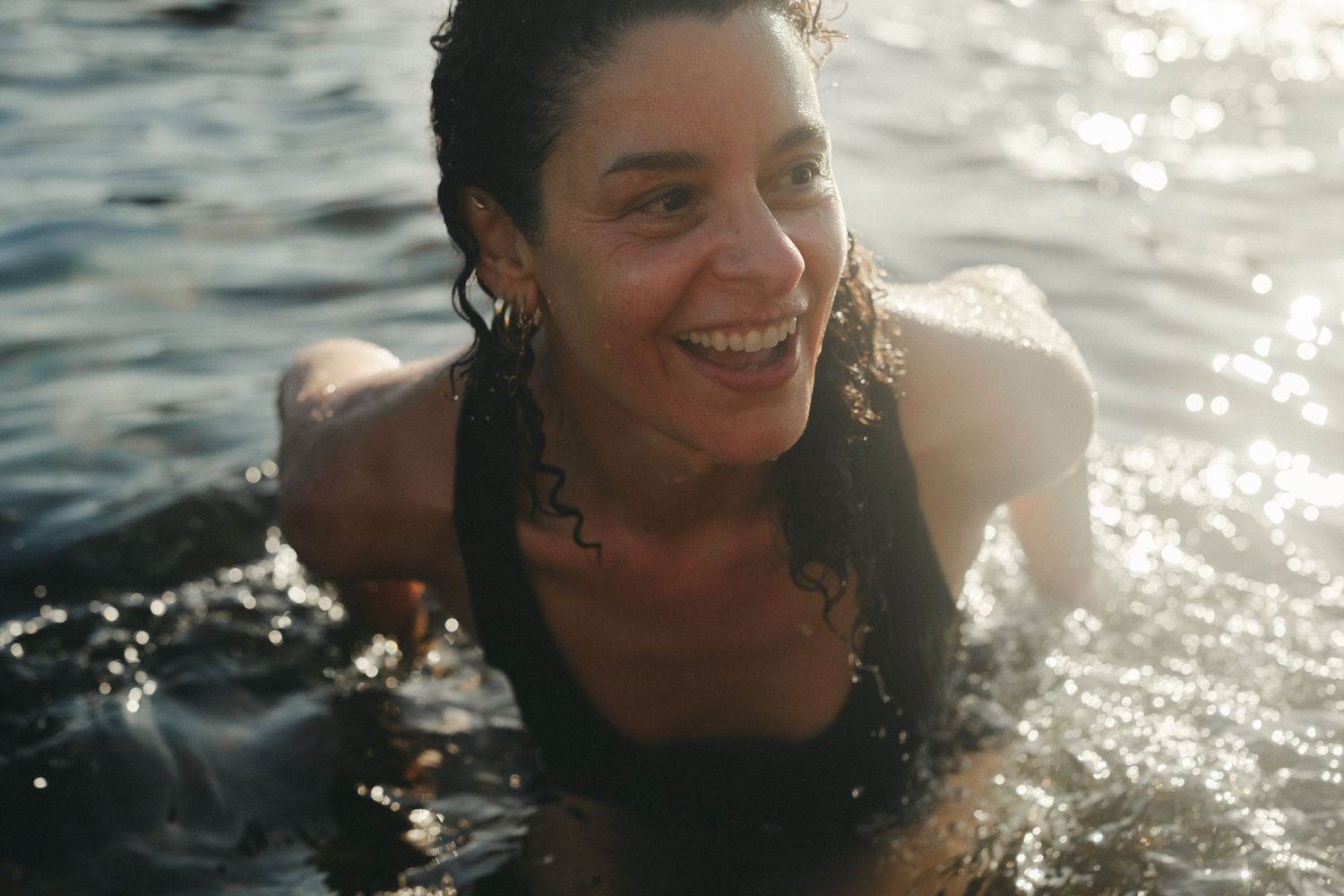 Lifestyle Photography - Candid lifestyle portrait photo of women in water at Palm Beach, Sydney
