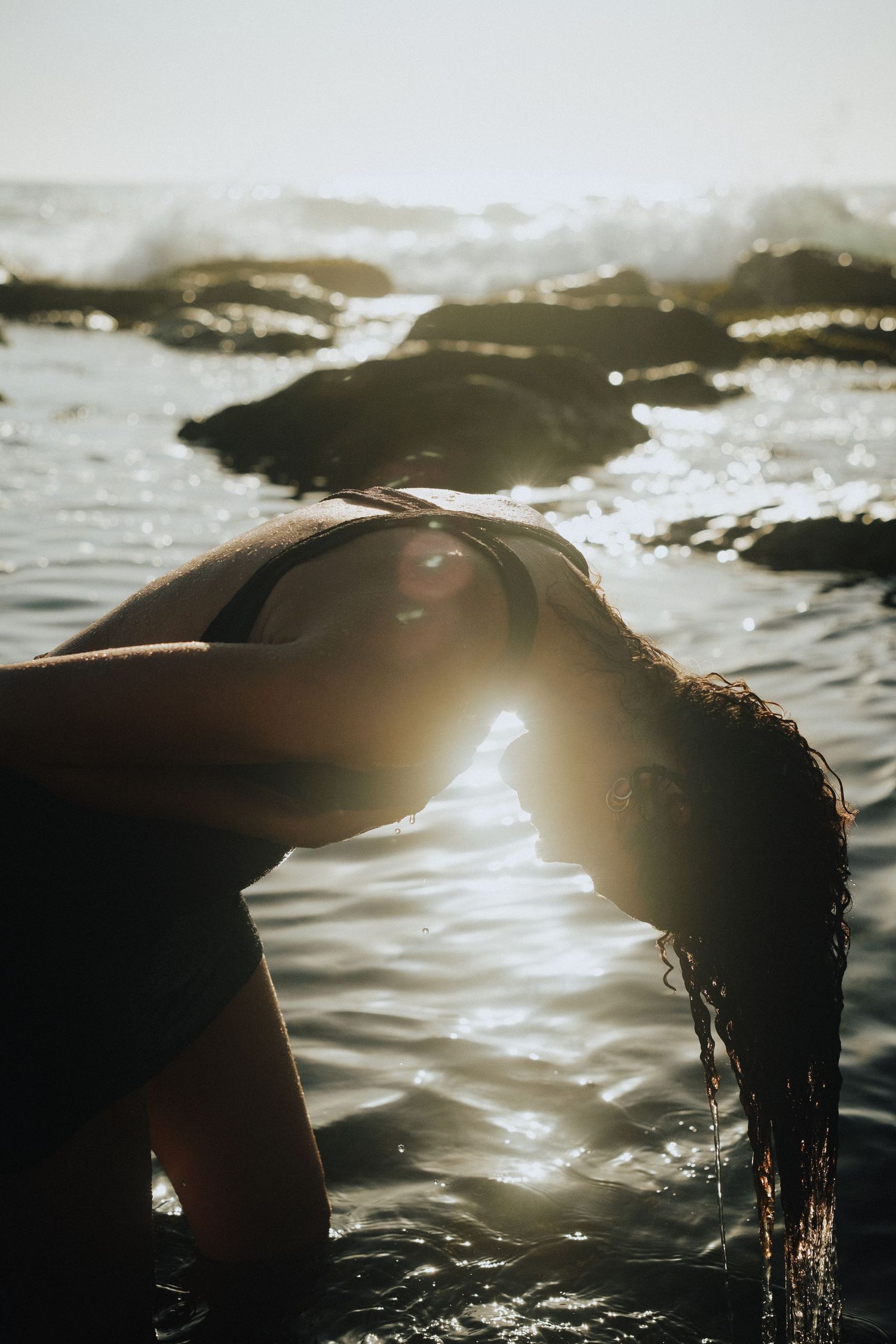 Lifestyle Photography - Sunrise lifestyle portrait session with women in water at Palm Beach, Sydney