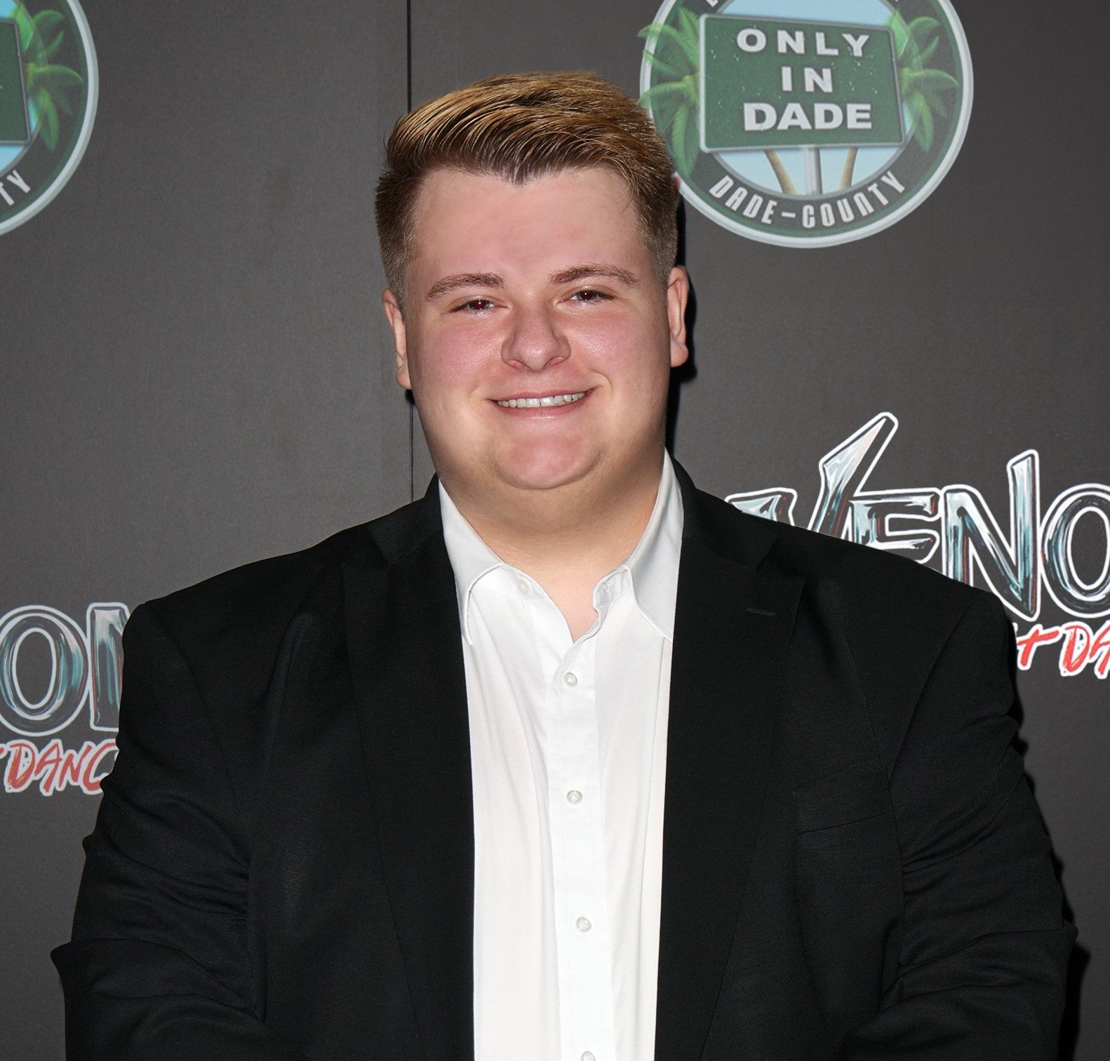 Person in formal attire at an entertainment event.