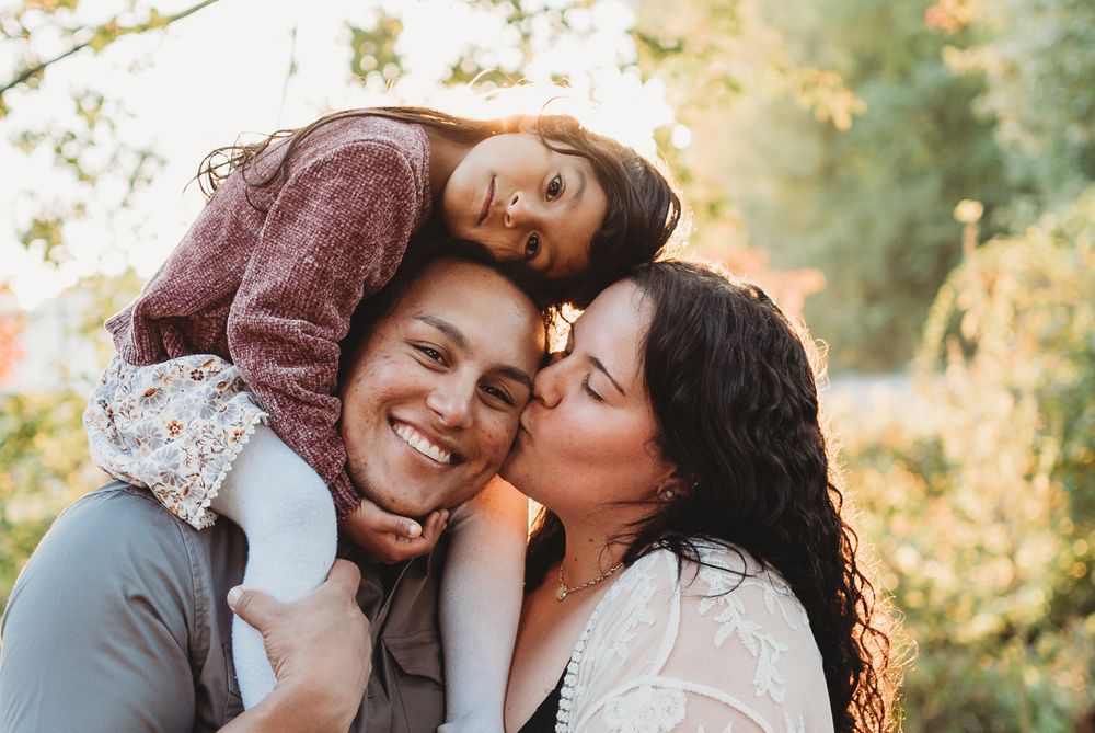 Three candid romantic moments captured in a natural outdoor setting during golden hour.