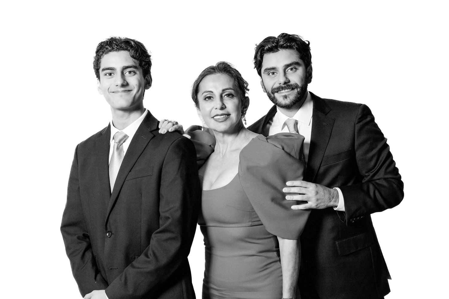 Black and white portrait series of wedding party members in formal wear.