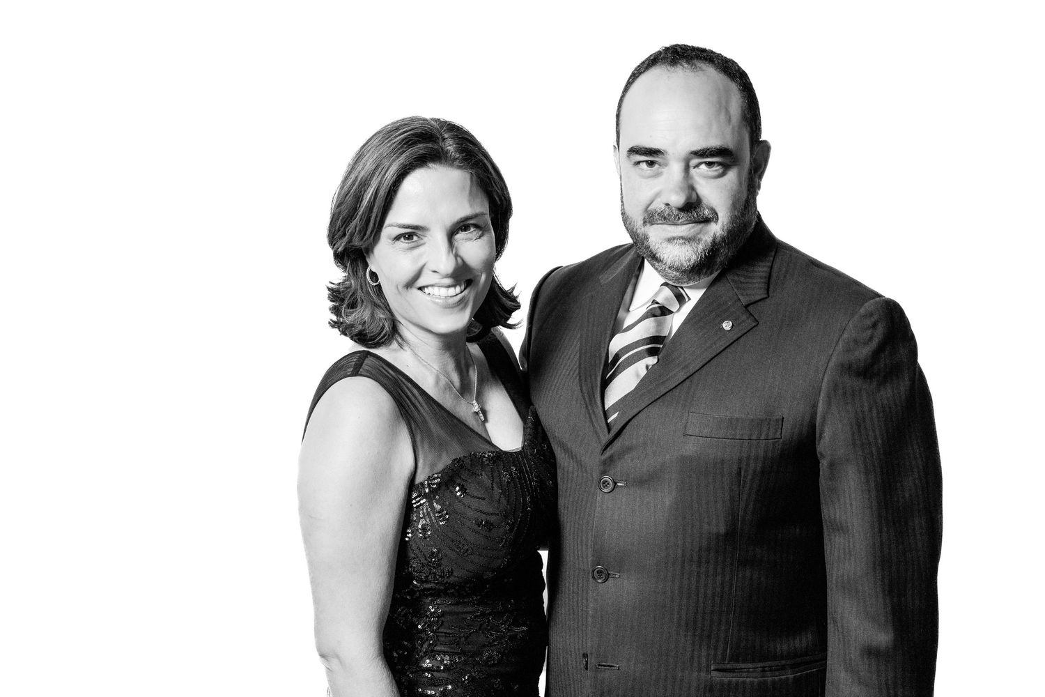 Formal black and white portrait of wedding party members.