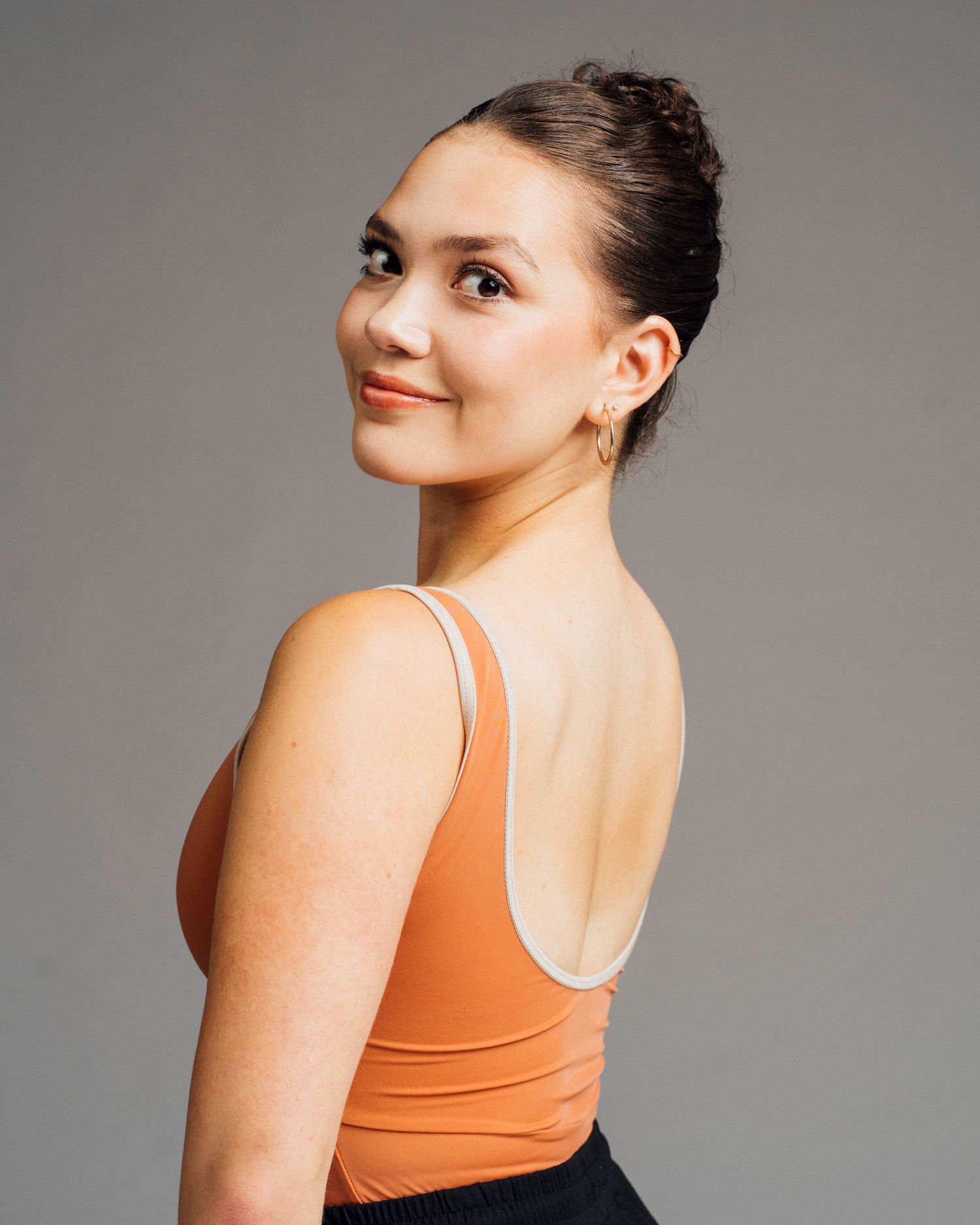 Professional Chicago dancer audition headshot showcasing ballerina personality in subtle posing.