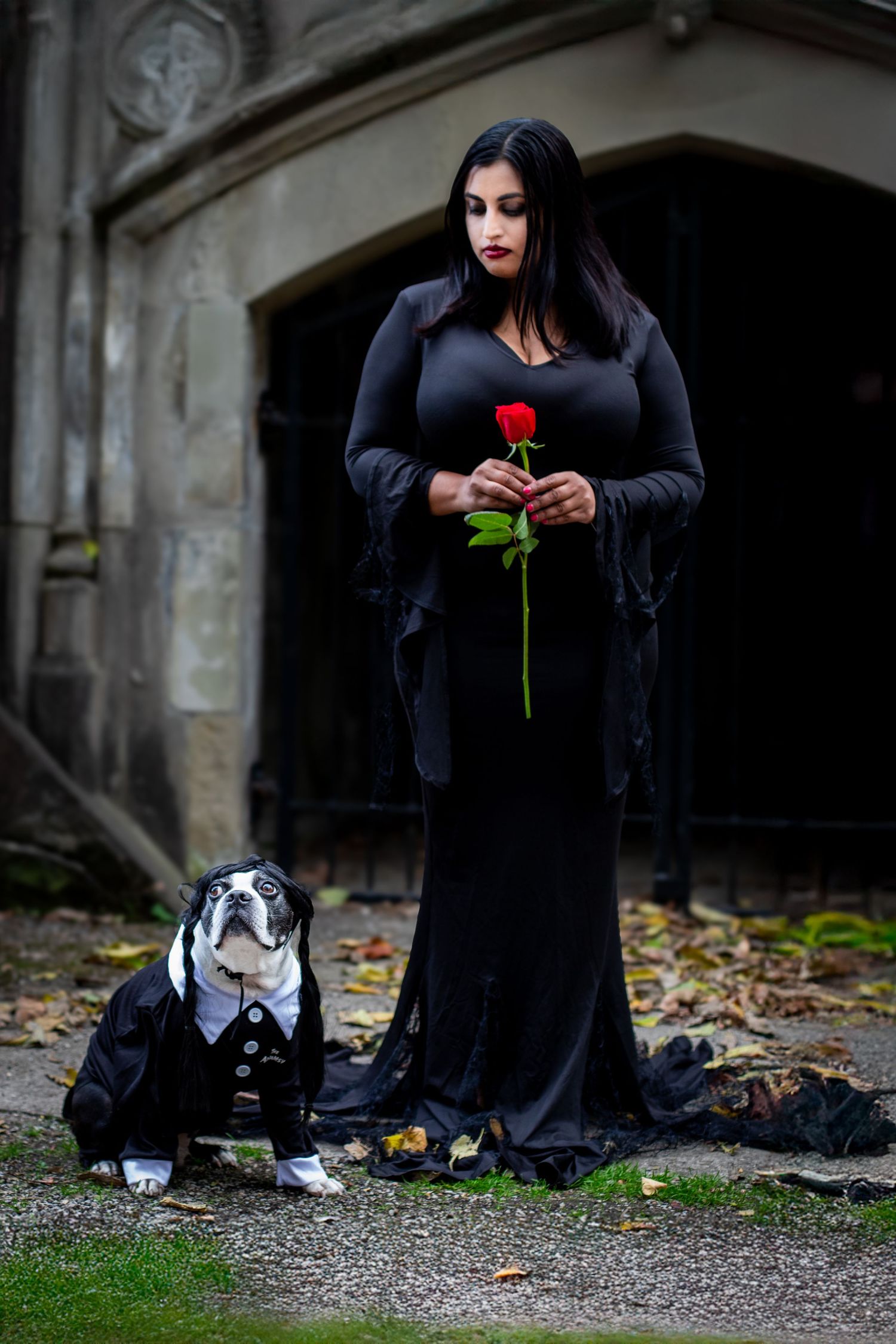 cincinnati gothic Halloween photography featuring Addams Family couple portraits at Spring Grove Cemetery with eerie, cinematic lighting