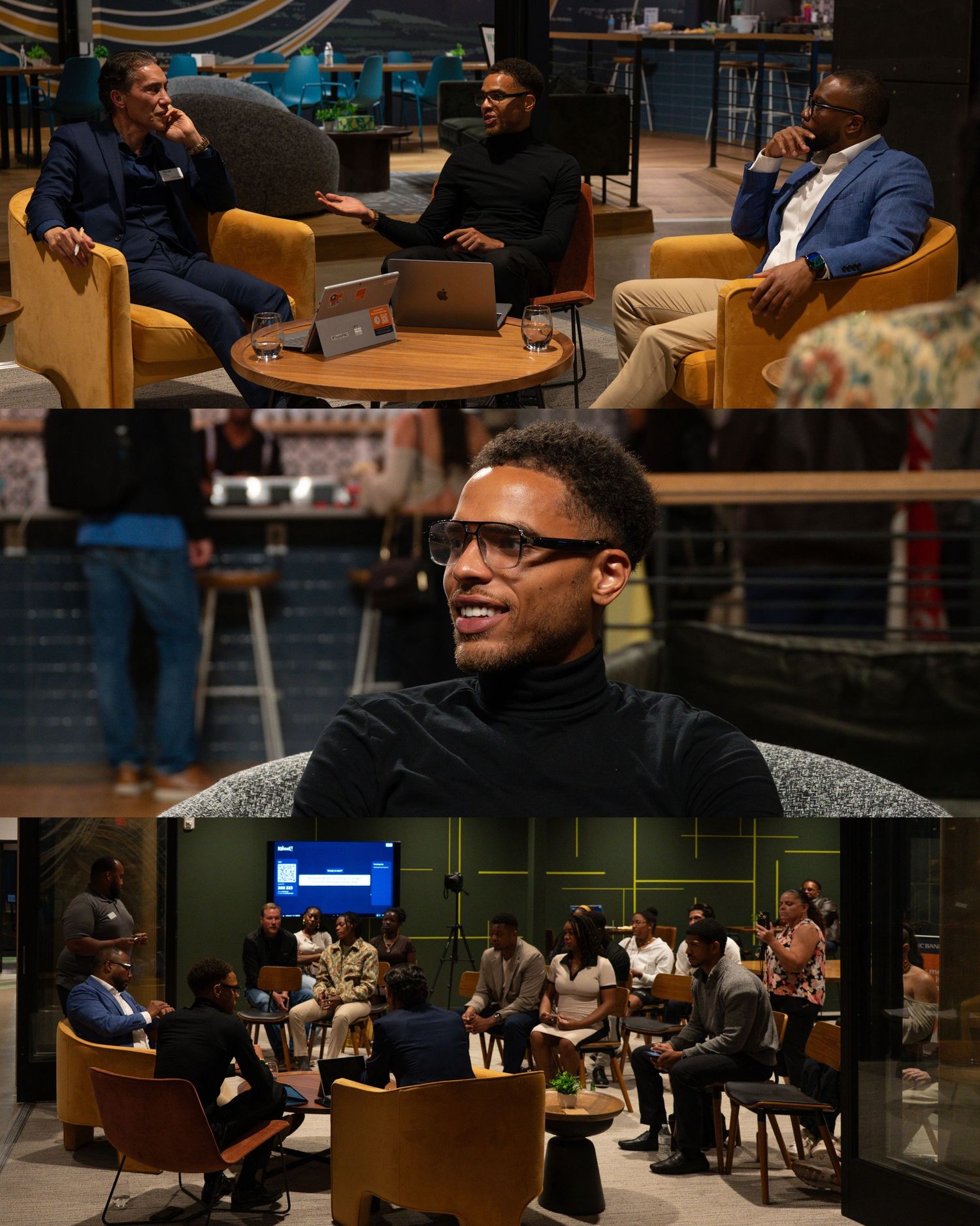 A person wearing glasses sits in a modern coffee shop with other patrons visible in the background.