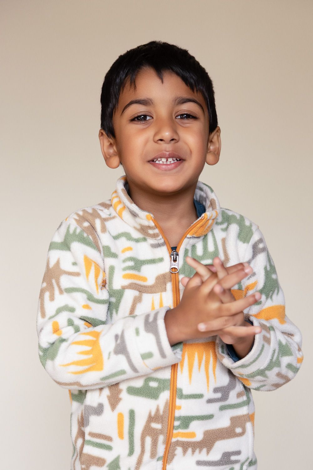 A child smiles for Picture Day in the Bay Area