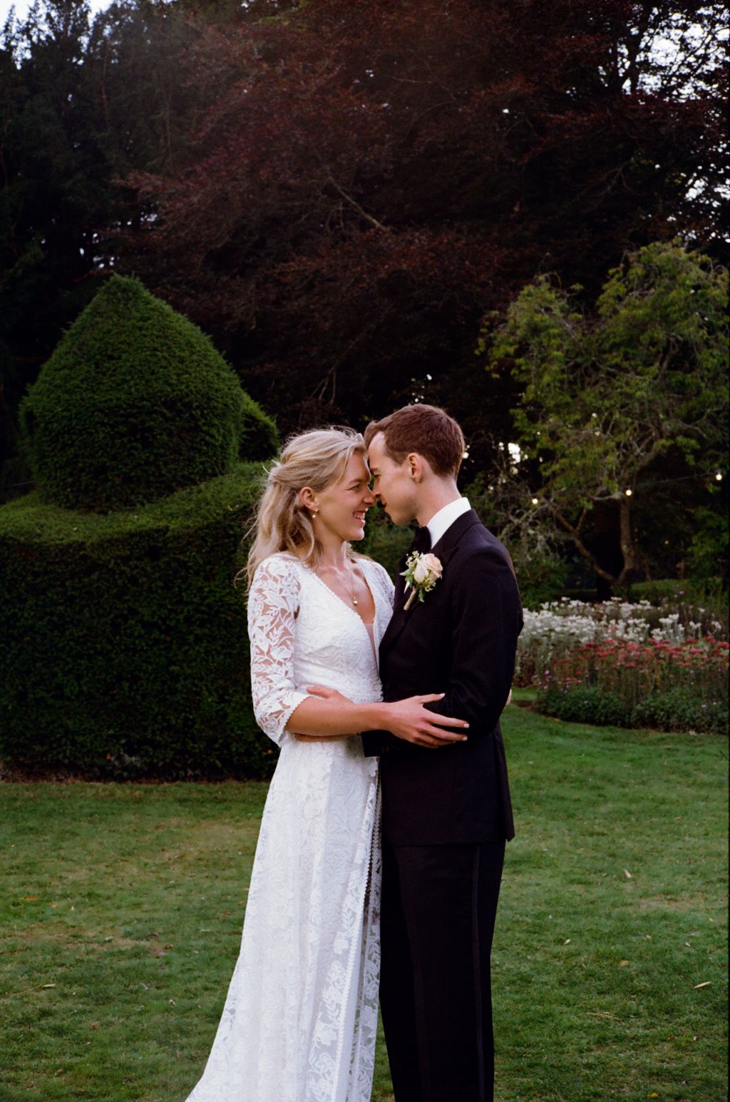 Bride & Groom in an embrace at sunset hour
