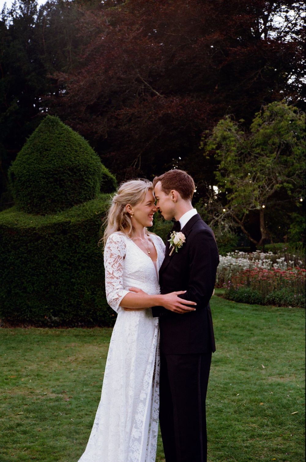 Bride & Groom in an embrace at sunset hour