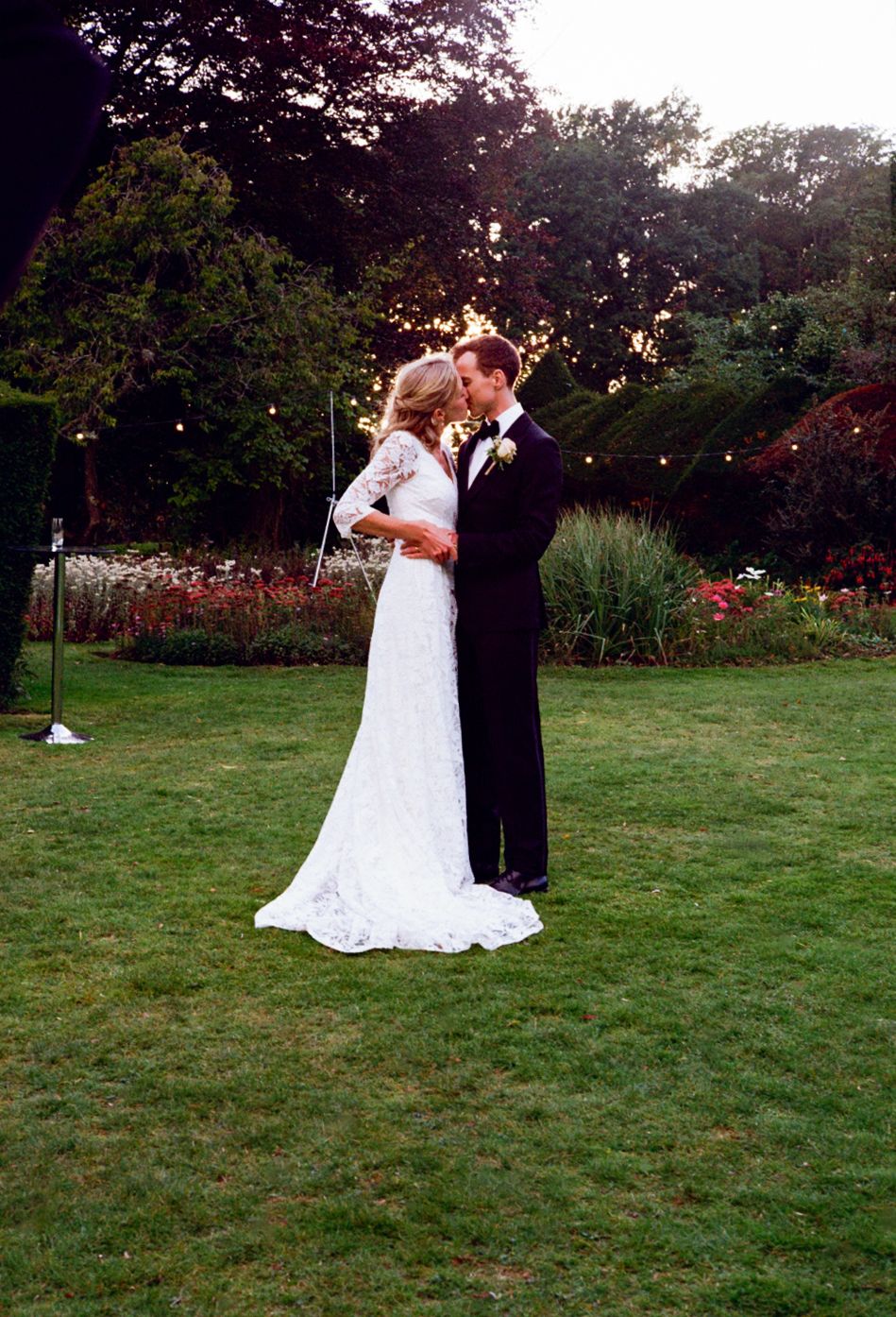 Bride & Groom in an embrace at sunset hour
