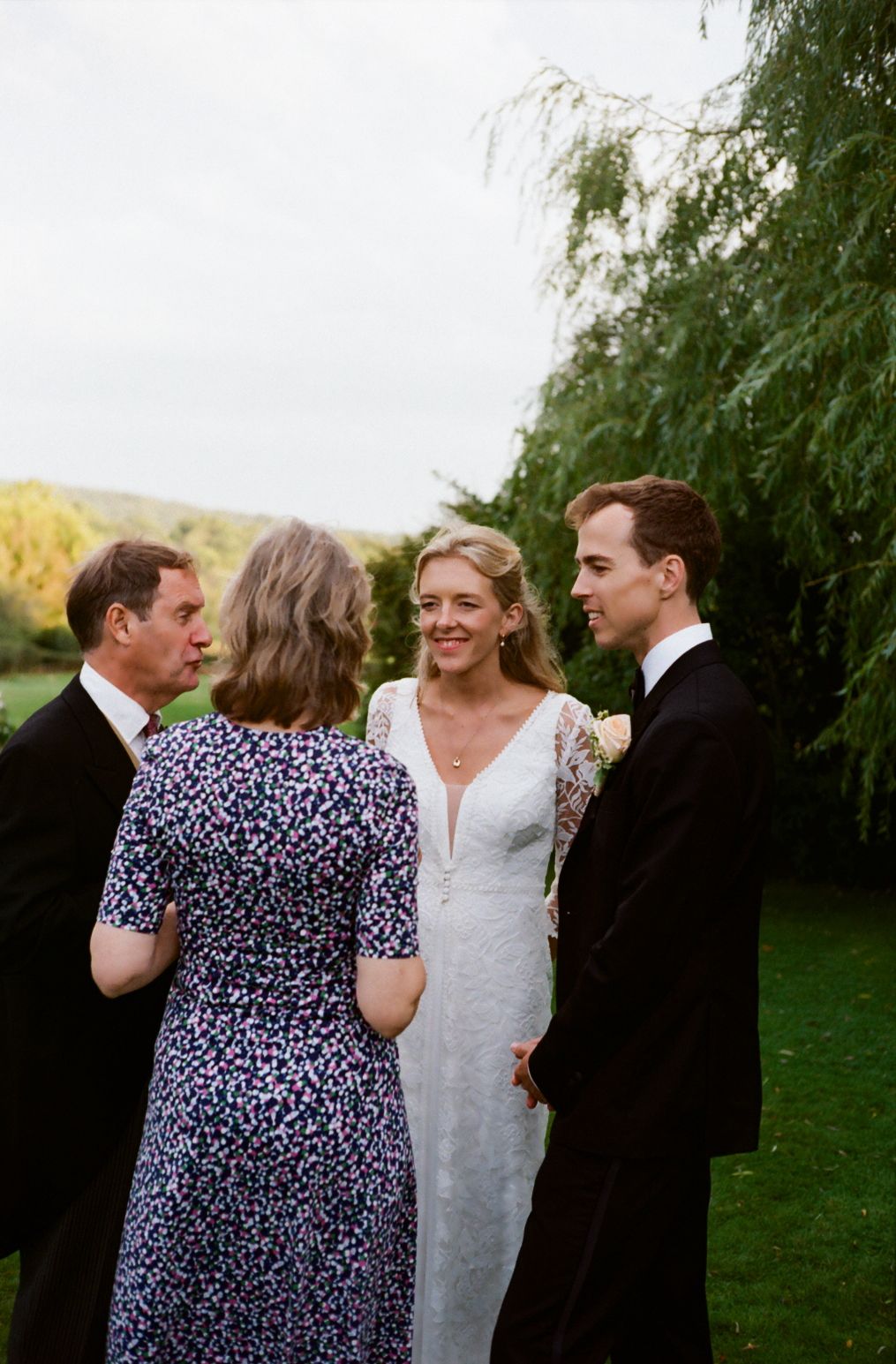 Bride & groom interacting with guests