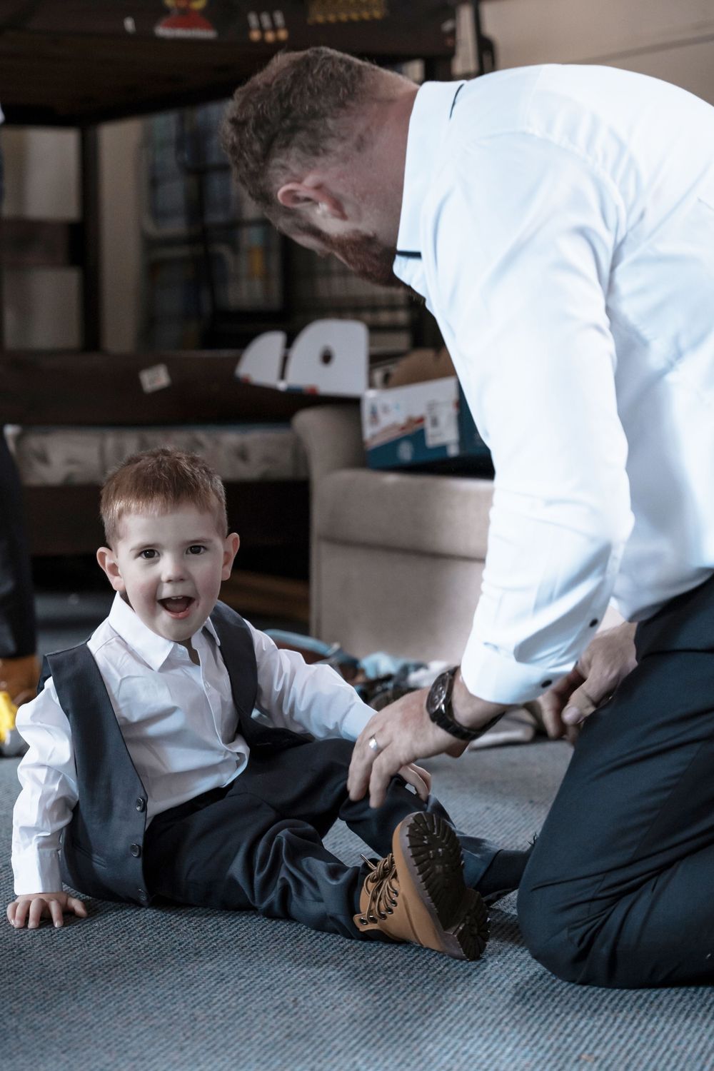A sequence of photos showing crawling movements across a grey carpeted floor.
