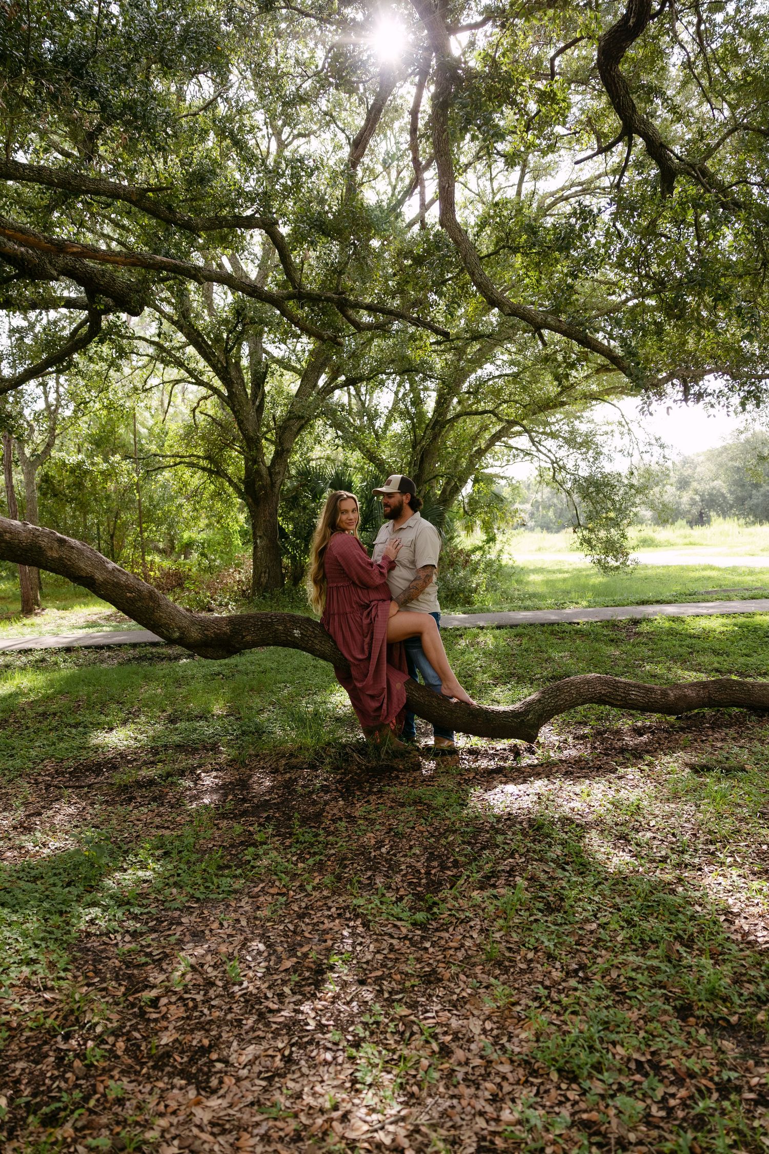 Fort Myers maternity session with Eric and Taylor captured in warm golden light and natural, candid family moments.