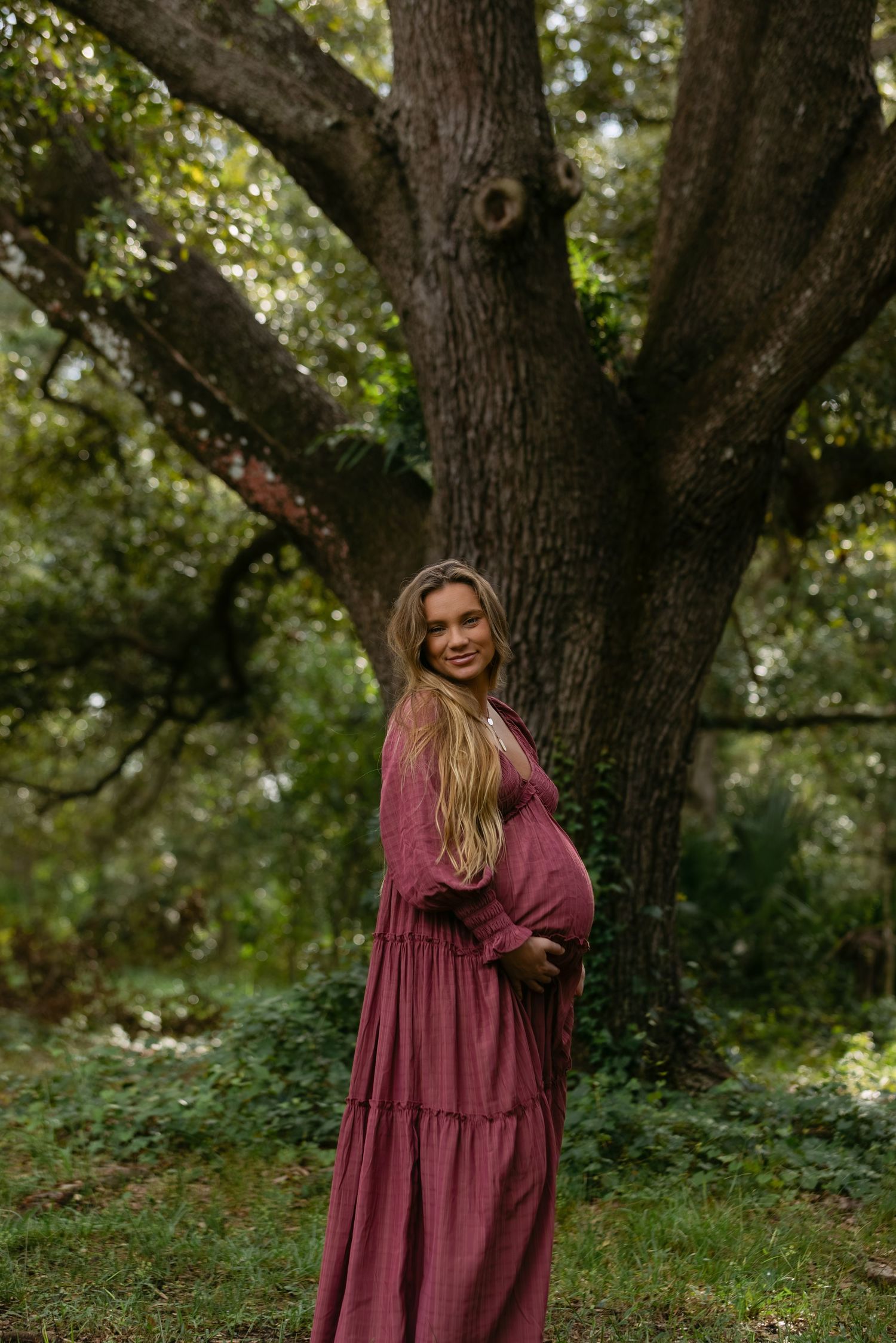 Fort Myers maternity session with Eric and Taylor captured in warm golden light and natural, candid family moments.