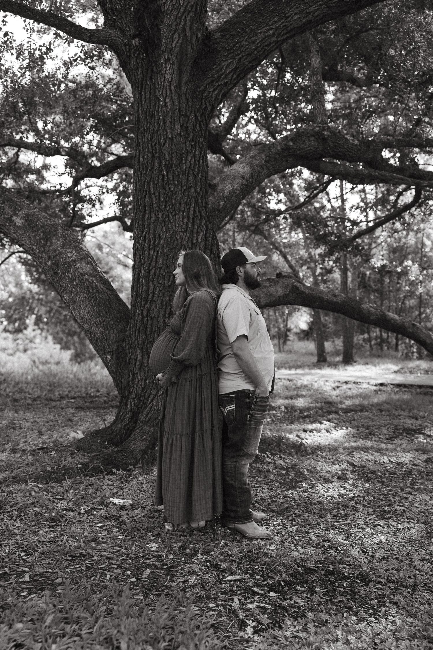 Fort Myers maternity session with Eric and Taylor captured in warm golden light and natural, candid family moments.