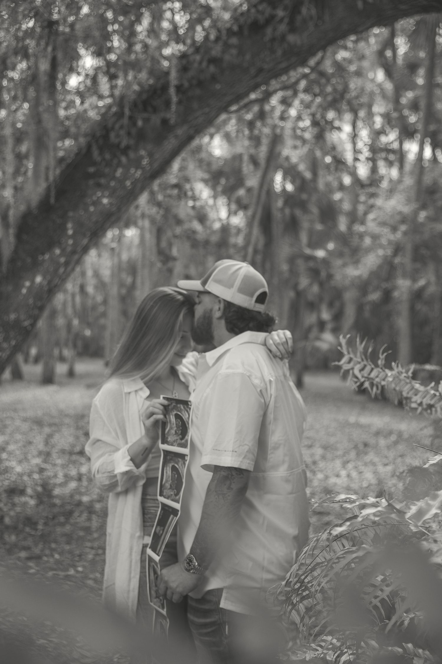 Fort Myers lifestyle maternity photos of Eric and Taylor with emotional, natural storytelling and golden-hour light.