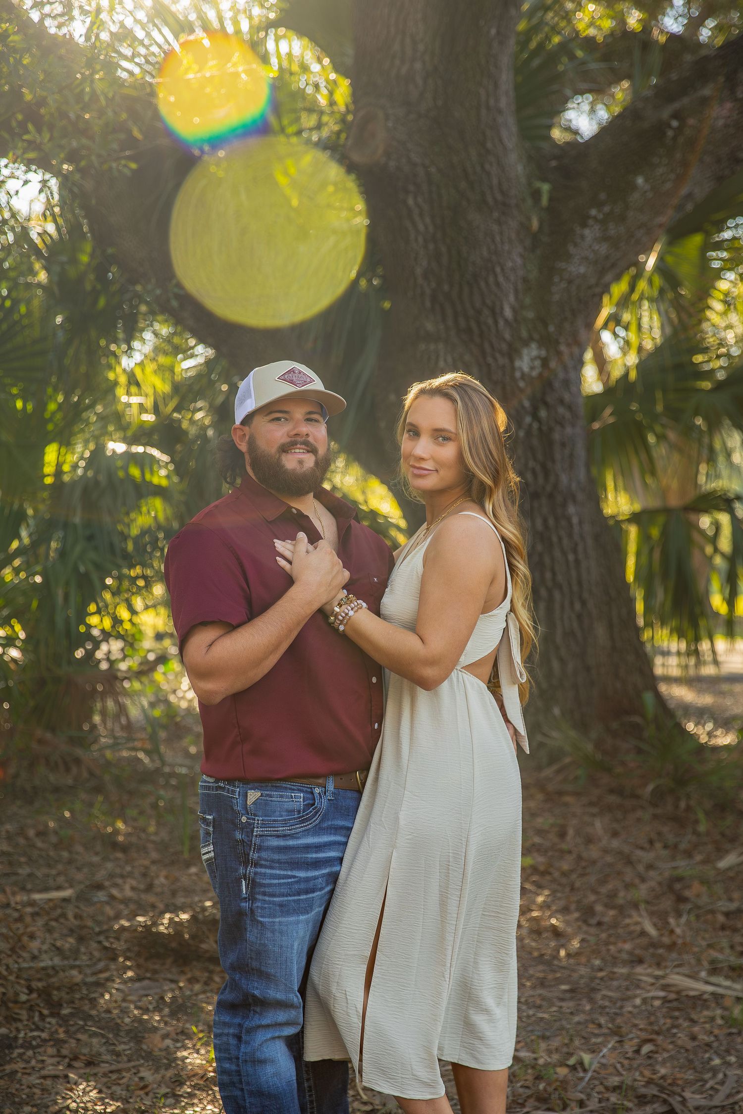 Fort Myers maternity portraits of Eric and Taylor with warm tones, natural posing, and emotional storytelling.